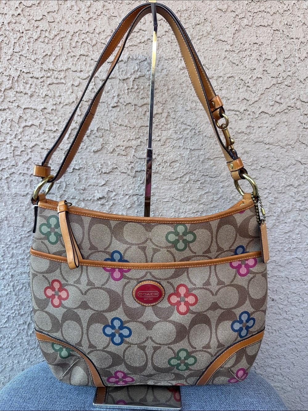 Coach Tan Trim Signature Canvas Shoulder Bag with Multicolor Flower Motif